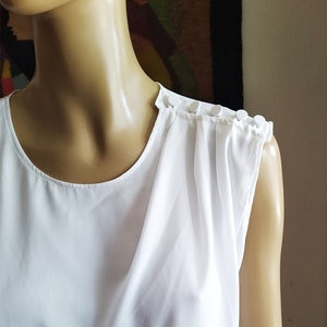 White Blouse with Shoulders Buttons