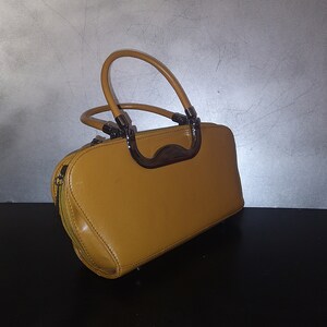 Brown Top Bag with Metal Decoration