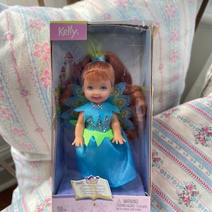 Vintage Barbie kleine Schwester Kelly Doll in Originalverpackung Fantasy Tales rote Haare Schmetterling