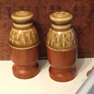 Vintage retro wood and ceramic salt and pepper shakers in a weave pattern rustic boho style. 1970s groovy style. Made in Japan.