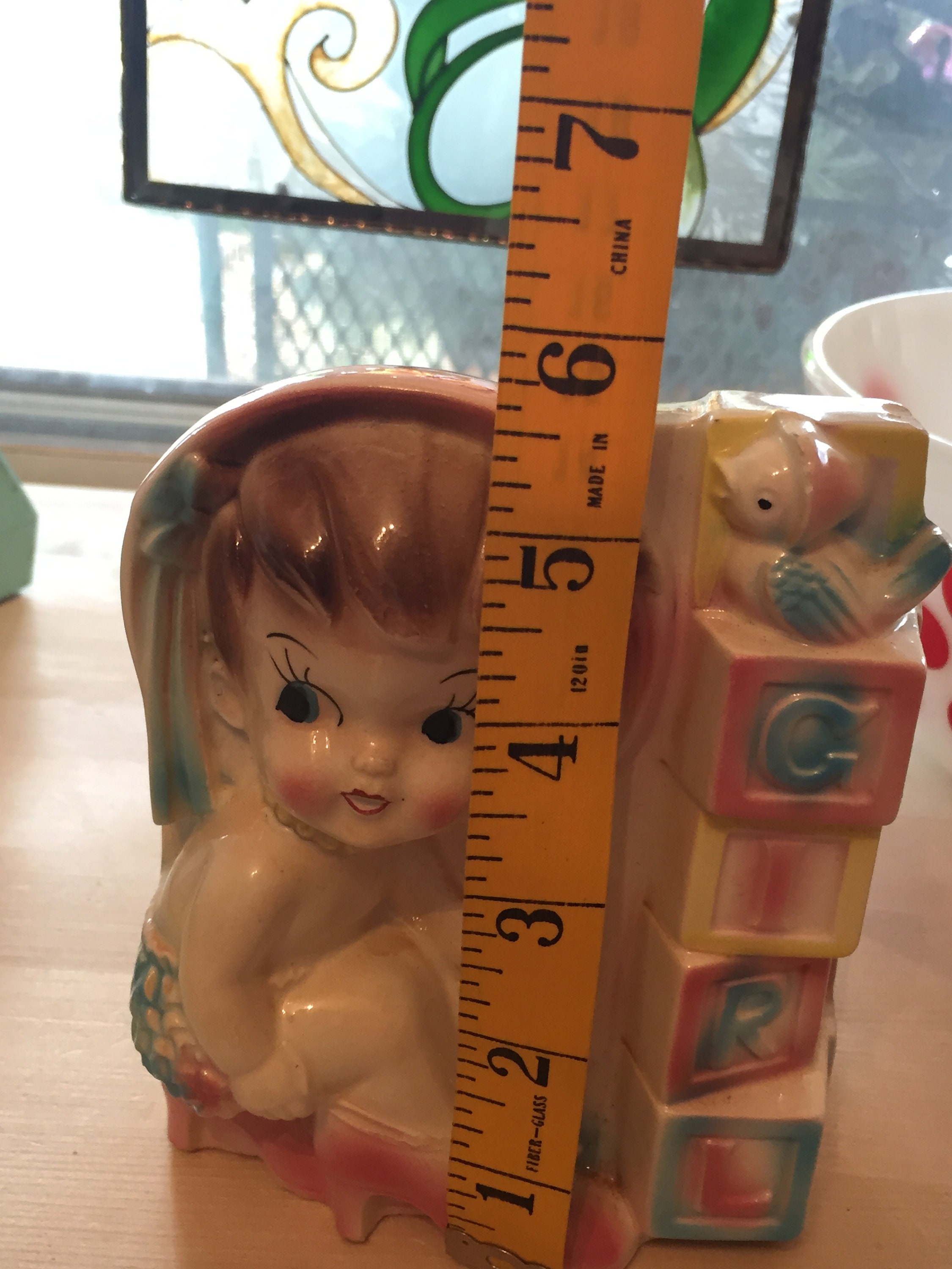 ヴィンテージ ルーベンズ ベビーガール プランター ツインテールと