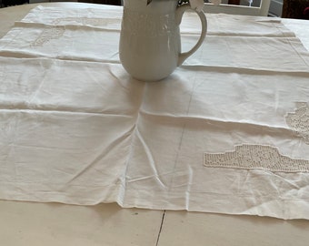 Antique white linen tablecloth with needlework crochet accents. 35 X35 inches square.