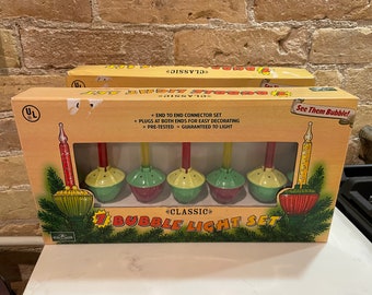 Reproduction Bubble Christmas lights ,New in box,  2 Sets, sold separately set of seven  lights with electrical strand each