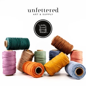 May include: Assortment of 10 spools of 5mm thick cotton string in various colors, including teal, brown, beige, green, blue, yellow, orange, pink, and light blue. The spools are arranged on a white surface. The label on one spool reads "5mm Lush Cotton String".