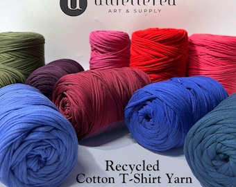 May include: Assortment of colorful recycled cotton t-shirt yarn in various shades of blue, red, purple, green, and pink.  Unfettered Art & Supply.