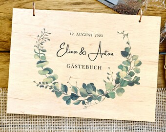 Elegant guest book for the wedding made of wood