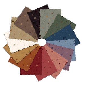 May include: A circular arrangement of fabric swatches with pinked edges, featuring a variety of colors including cream, tan, brown, black, green, blue, purple, and red, all patterned with small, scattered gold-toned star shapes.