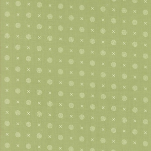May include: A pale green fabric featuring a repeating pattern of white circles and small white crosses. The circles are composed of tiny white dots. The fabric has a textured appearance.