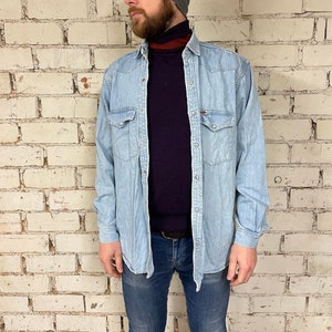 Camisa vaquera azul claro vintage de Henry Choice (talla S/M)
