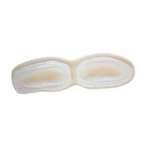 Pode incluir: Um par de palmilhas de silicone bege com uma superfície texturizada. As palmilhas são projetadas para fornecer amortecimento e suporte para os pés.