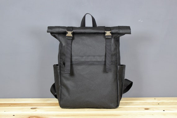 waxed canvas roll top backpack