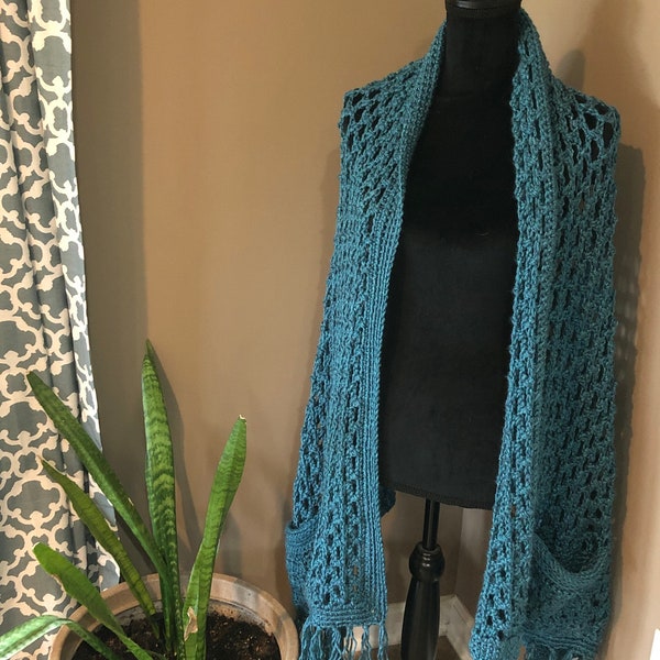 a shawl with pockets