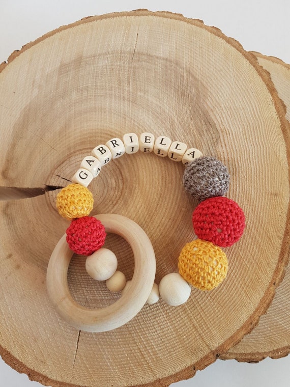 hanging egg in baby sock for teething