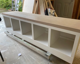 Add-on fee solid dividers between cubbies of entryway bench