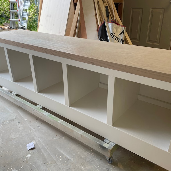 Add-on fee solid dividers between cubbies of entryway bench