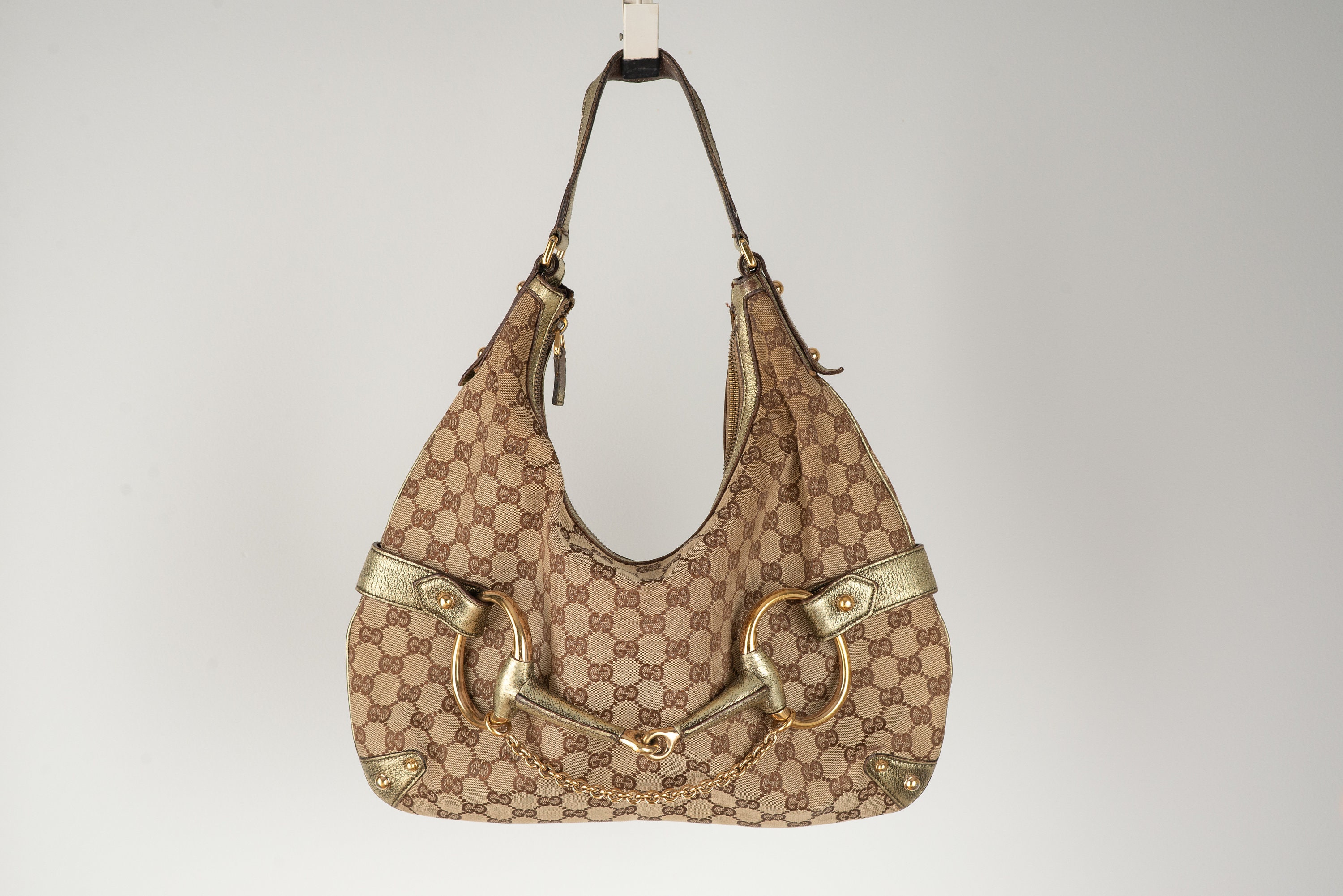 Sold at Auction: VINTAGE GUCCI LOGO MONOGRAM HOBO SHAPED BAG PURSE