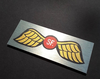 Small Jedburgh wings on Brushed Aluminium