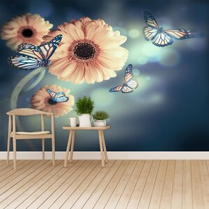May include: A blue wall with a floral wallpaper featuring yellow flowers and blue butterflies. A wooden chair and table are in the foreground.