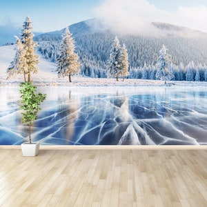 Frozen lake vinyl or self-adhesive wallpaper | mural Blue ice and cracks on the surface of the ice. Frozen lake under a blue sky in the...,,