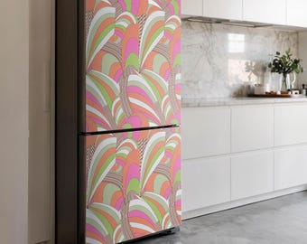 May include: A fridge with a bold, retro design. The pattern is made up of curved lines and shapes in pink, orange, green, and white. The design covers the entire front of the appliance, creating a vibrant and eye-catching look for a kitchen.