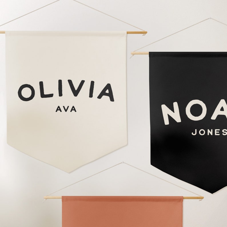 3 pennant style banners in natural, black and firelight colors. Custom name banner.