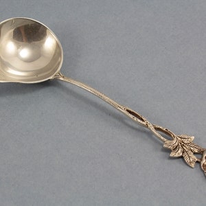 Cream spoon made of silver with a beautiful rose, small cream ladle, silver cutlery