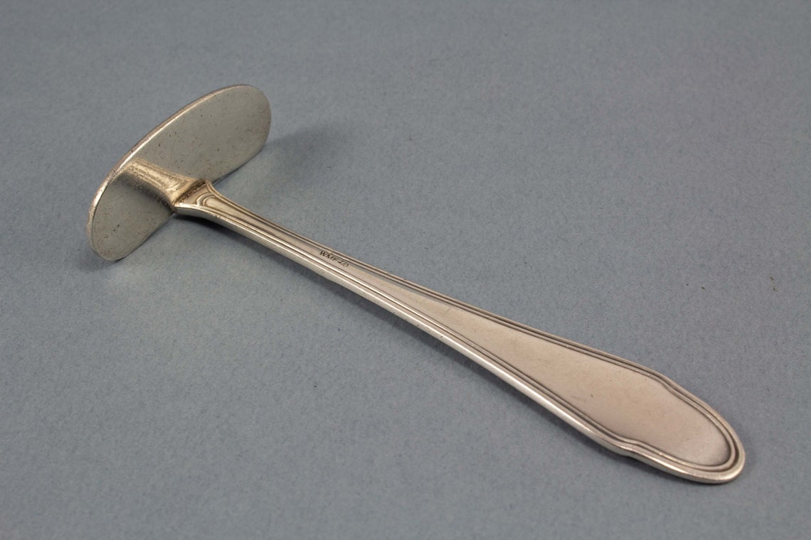 Silver plated porridge pusher from WMF food pusher Etsy