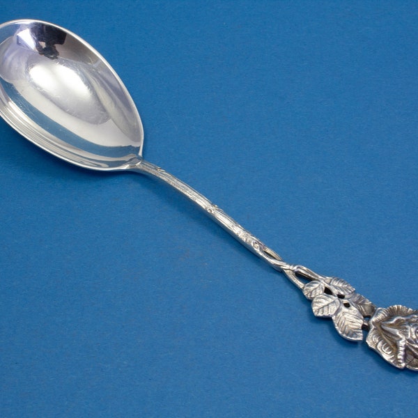 Silver-plated cream spoon with a rose pattern