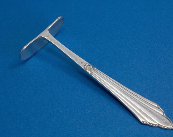 WMF Baby Food Pusher in a Fan Pattern, Silverplated Children's Food