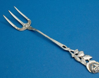 Silver plated fork with roses, bread fork