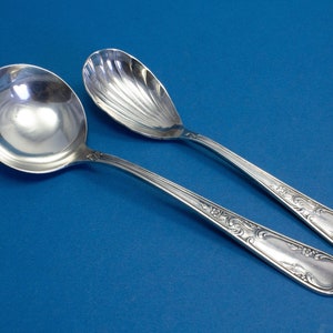 Cream spoon and sugar spoon