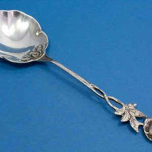 Big cream spoon with roses, silver
