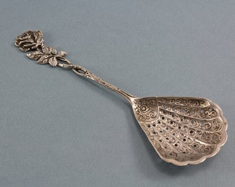 Silver sugar spoon with roses, 835 silver