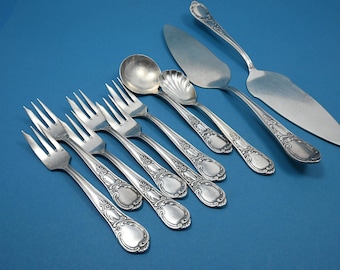 Beautiful silver-plated cutlery set in Rococo style