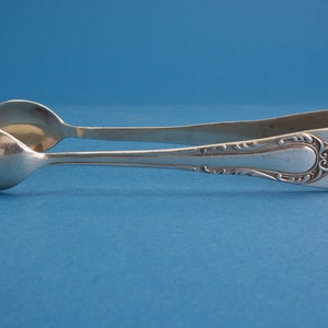 Silver plated sugar tongs