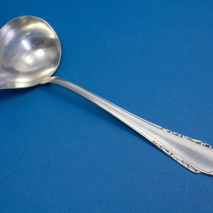 Gravy and sauce ladle R.F.