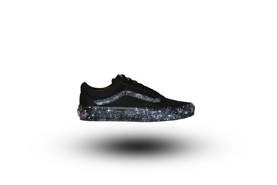 all black vans with white stripe