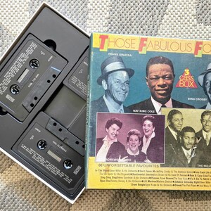 May include: A boxed set of three cassette tapes and a compilation album titled "Those Fabulous Forties." The album cover features Frank Sinatra, Nat King Cole, and Bing Crosby. The cassette tapes are black.