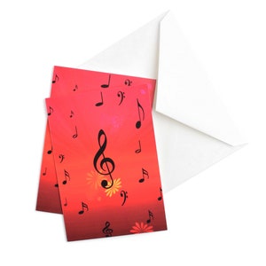 Juego de notas musicales en caja con flores