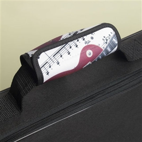 Luggage Handle Wrap With Instrument Design