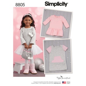 May include: A Simplicity pattern featuring children's clothing designs. The image shows a young girl wearing a gray dress with a white tutu skirt, pink boots, and a matching purse. Additional designs include a pink dress with pearl accents and a gray dress with a pink pocket.
