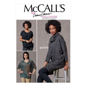 May include: McCall's sewing pattern M7979 featuring three different top designs. The tops include a black short-sleeve top, a patterned top with three-quarter sleeves, and a gray cowl-neck tunic. The pattern includes the Palmer/Pletsch tissue fitting method.
