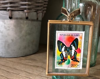 Framed Vintage Guinea Stamp: Butterfly Art, Brass Edge Decor