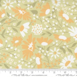 May include: A green fabric with a floral pattern featuring white and orange flowers. The fabric has a subtle texture and a vintage aesthetic.