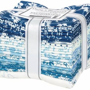 May include: A stack of 42 fat quarter fabric bundles in shades of blue and white with a floral pattern. The fabric is wrapped in white tissue paper and tied with a white ribbon. The label reads "Daisy's Bluework - A Collection by Debbie Maddy - Fat Quarters".