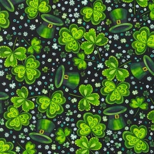 May include: A black background with a repeating pattern of green shamrocks and green leprechaun hats. The shamrocks have a swirl design and the hats have a gold buckle.