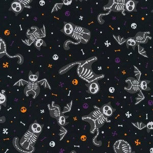 May include: A black and white seamless pattern featuring skeleton cats with wings and bones. The background is black with white and orange dots.