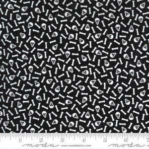 May include: Black fabric with a white repeating pattern of skulls and bones. The fabric is measured in inches.