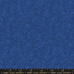May include: A blue fabric with a white polka dot pattern. The fabric is a solid blue color with small white dots scattered throughout. The dots are evenly spaced and create a subtle texture. The fabric is perfect for quilting, sewing, and crafting.