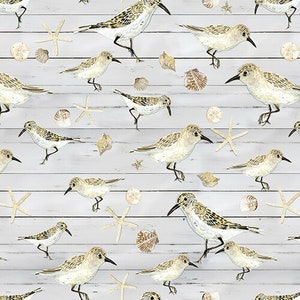 May include: A seamless pattern featuring a whitewashed wood background with a repeating design of sandpipers, seashells, and starfish. The sandpipers are depicted in a light brown and gray color scheme, with some of them perched on the wood planks.